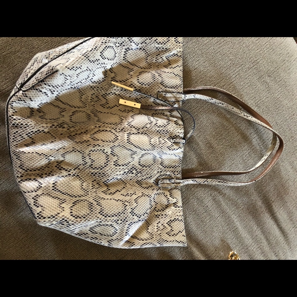 Reversible snakeskin/gold bag